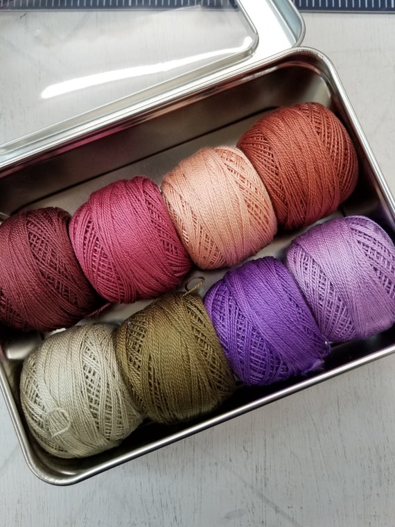 First Crush thread boxfeaturing 8 DMC perle cotton ballsno 8