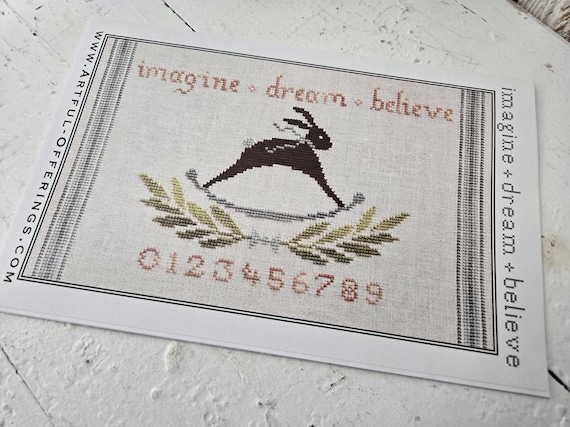 Imagine Dream Believe...Artful Offerings...cross stitch chart...Easter...spring...rabbit