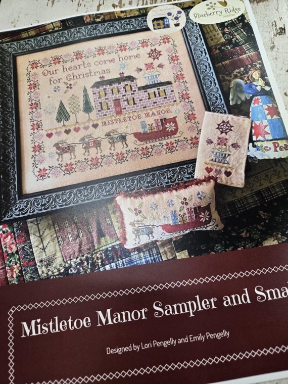 Mistletoe Manor Sampler and Smalls...designers Lori Pengelly and Emily Pengelly...Christmas cross stitch, winter cross stitch