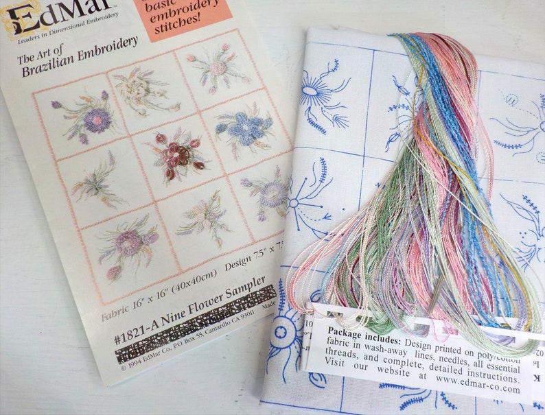 A Nine Flower Sampler...EdMar kit #1821...kit complete with instructions preprinted thread and