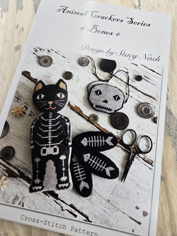 Bones, Animal Crackers Series by Stacy Nash Primitives...cross stitch chart, cat, skeleton, halloween