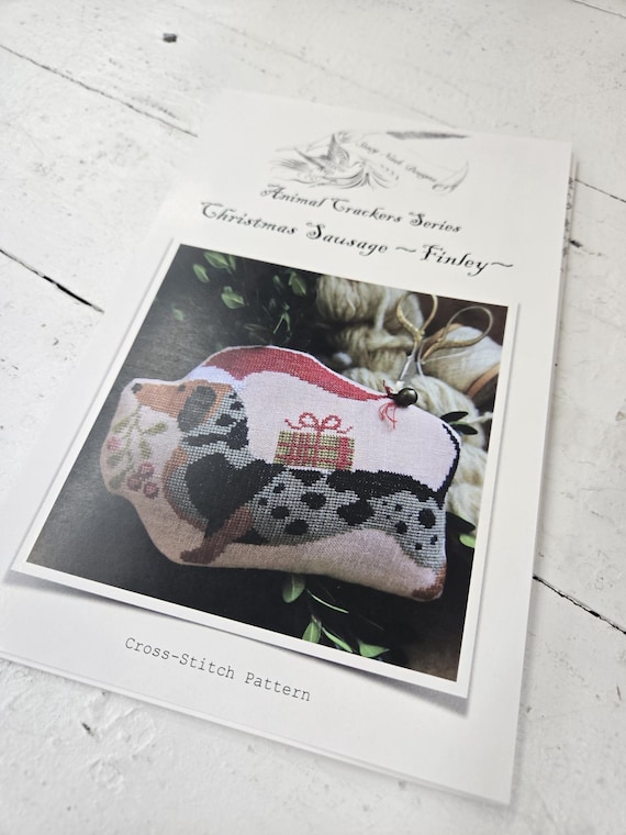 Finley, Christmas Sausage, Animal Crackers Series...Stacy Nash Primitives...cross stitch chart...wiener dog cross stitch