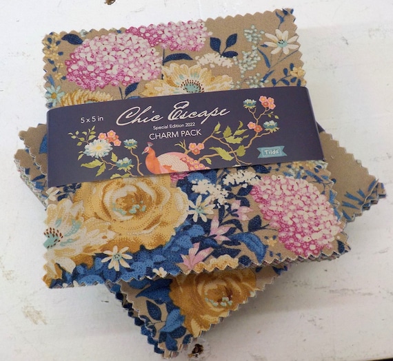 Tilda Chic Escape, 5 inch charm pack..a Tilda Collection designed by Tone Finnanger, 40--5 inch squares