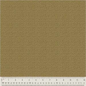 May include: A close-up of a brown fabric with a subtle, repeating pattern of small black dots. The fabric has a textured, woven appearance.