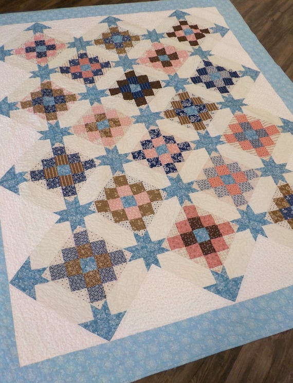 Summer in the Garden quilt kit...designed by Mickey Zimmer for Sweetwater Cotton Shoppe...blue, pink and brown quilt