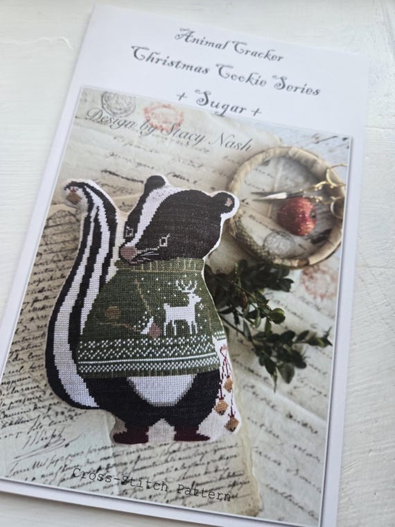 Sugar...Animal Cracker Christmas Cookie Series...Stacy Nash Primitives...cross stitch chart...skunk