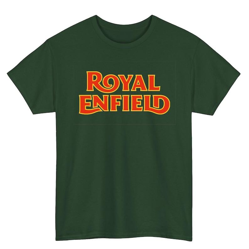 May include: A dark forest green short-sleeved t-shirt featuring the text ROYAL ENFIELD printed in a bold, stylized yellow font with a thin red outline centered on the chest. The garment has a classic crew neckline and a standard straight hem.