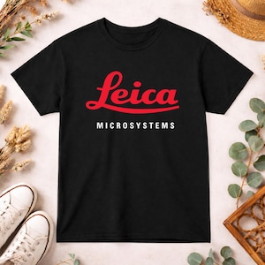 May include: A trio of ceramic mugs with a speckled, matte finish in light blue, cream, and grey. The mugs have a simple, modern design with a rounded shape and a comfortable handle.