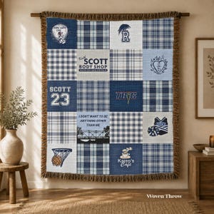 May include: A woven throw blanket featuring a blue and white plaid patchwork design with various graphic prints including Keith Scott Body Shop, Scott 23, a basketball hoop, a bridge, and text such as I Don't Want To Be Anything Other Than Me.