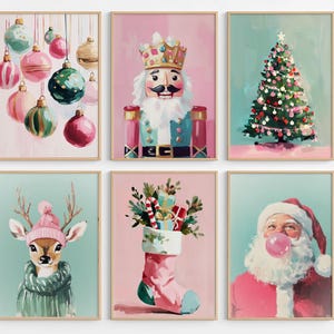 May include: Set of six framed Christmas-themed art prints. The prints feature colorful illustrations of ornaments, a nutcracker, a Christmas tree, a deer, a stocking, and Santa Claus blowing a bubble.