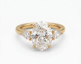 Oval Diamond Engagement Ring – Yellow Gold Three Stone Ring with Pear Side Stones