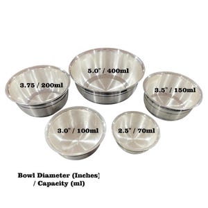 May include: A set of five silver-colored metal bowls of varying sizes. Each bowl features text indicating its diameter and capacity: 5.0"/400ml, 3.75"/200ml, 3.5"/150ml, 3.0"/100ml, and 2.5"/70ml. Text at the bottom reads: Bowl Diameter (Inches) / Capacity (ml).