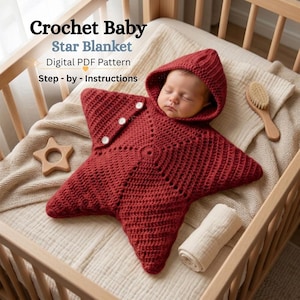 May include: A deep red crochet star-shaped baby blanket with an attached hood and three white buttons. The text reads: Crochet Baby Star Blanket Digital PDF Pattern Step-by-Instructions. The blanket is displayed on a light-colored fabric surface.
