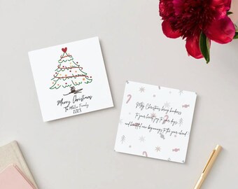 May include: Two square Christmas cards with handwritten messages and illustrations. One card features a Christmas tree design with the text "Merry Christmas To Addie Family 2025." The other card has a message about kindness.