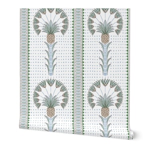 May include: Wallpaper roll featuring a repeating pattern of stylized pineapples and floral elements in shades of green, blue, and tan on a white background. The design includes dotted and geometric borders, creating a classic, elegant aesthetic. The roll is partially unrolled, showing the pattern.