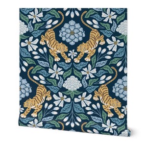 May include: A roll of wallpaper featuring a repeating pattern of orange tigers with black stripes, light blue flowers, and green leaves set against a dark navy blue background. The tigers are depicted in a pouncing pose amidst floral elements.