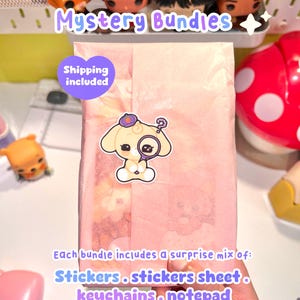 May include: A pink paper-wrapped mystery bundle with a cartoon dog sticker holding a magnifying glass. The text "Mystery Bundles" is above the bundle. The text "Stickers, sticker sheet, keychains, notepad" is below the bundle.
