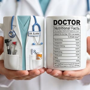 May include: White ceramic mug with a doctor's coat design, stethoscope, and the text "DR. ELARA." The other side features a "DOCTOR Nutritional Facts" label. The mug includes a prescription symbol and medical tools.