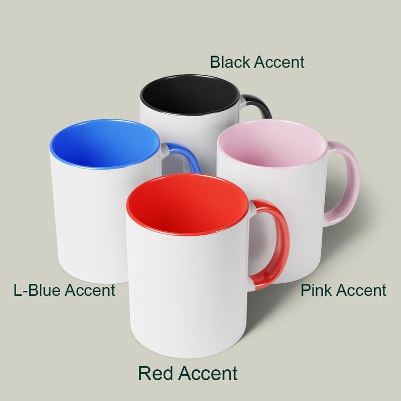 May include: Four white ceramic mugs with colored accents. The mugs have a white exterior and feature interior and handle accents in black, light blue, red, and pink. Text on the image indicates the accent colors.