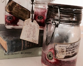 Wandering Eye Potion Bottle Prop - A magical jar with a realistic human eye. For Halloween, Christmas, Oddities, Macabre.