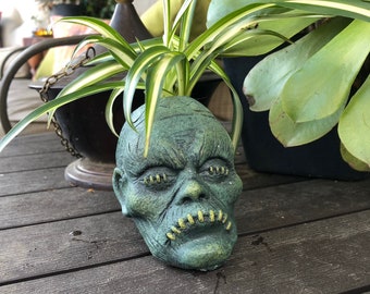 Shrunken heads voodoo bud vase / planter - for succulents, flowers, or small plants.