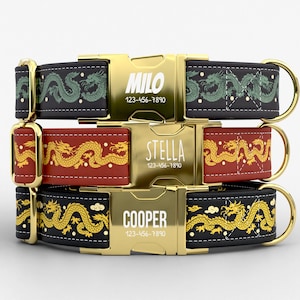 May include: Three personalized dog collars with gold-colored buckles. The top collar is black with a green dragon design, the middle is red with a gold dragon, and the bottom is black with a gold dragon. Each buckle has a name and phone number.