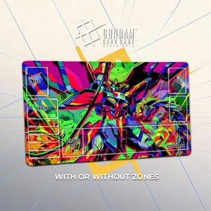 May include: A rectangular Gundam card game playmat with a vibrant, colorful design. The mat features a detailed illustration of a Gundam robot in shades of red, green, purple, and blue. Text on the mat includes "BASE", "SHIELDS", "DECK", "TRASH", and "RESOURCE AREA". The text "WITH OR WITHOUT ZONES" is also visible.