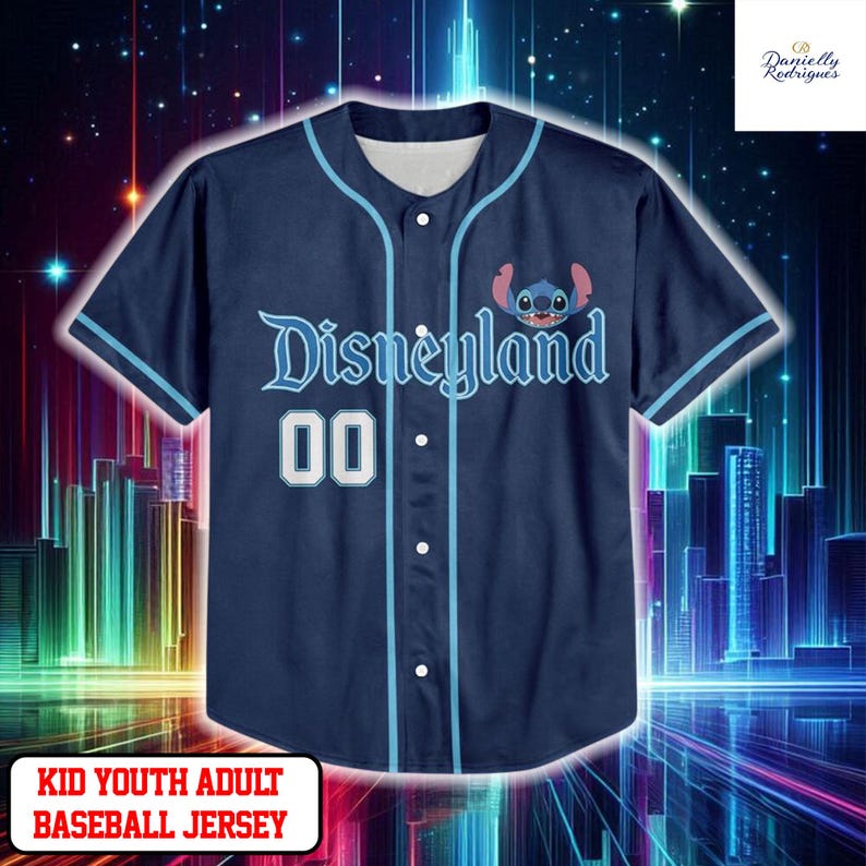 A blue baseball jersey with the word "Disneyland" printed on it, featuring a cartoon character. The jersey is displayed against a colorful, starry background.