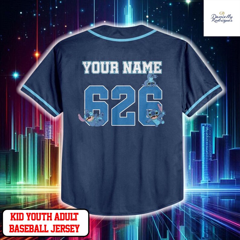 A dark blue baseball jersey with the text "YOUR NAME" and the number "626" printed on it, along with a cartoon character. The jersey appears to be a custom-made item for a child or young adult.