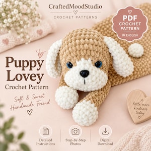 May include: A crochet puppy lovey pattern featuring a tan and white plush puppy with blue eyes and a black nose. The text reads CraftedMoodStudio, Puppy Lovey Crochet Pattern, PDF Crochet Pattern In English, and A little more kindness today.