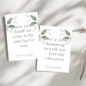 May include: Two white cards with text and watercolor leaf designs. One card reads "Place your hand on your belly and feel it rise." The other says "Take a slow, humming breath out - feel the vibration." Both cards have "Calm living design" at the bottom.