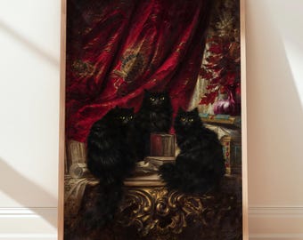 May include: A framed print featuring three black cats with yellow eyes. The cats are positioned on a decorative surface in front of a red curtain. Books and a vase of red leaves are visible in the background.