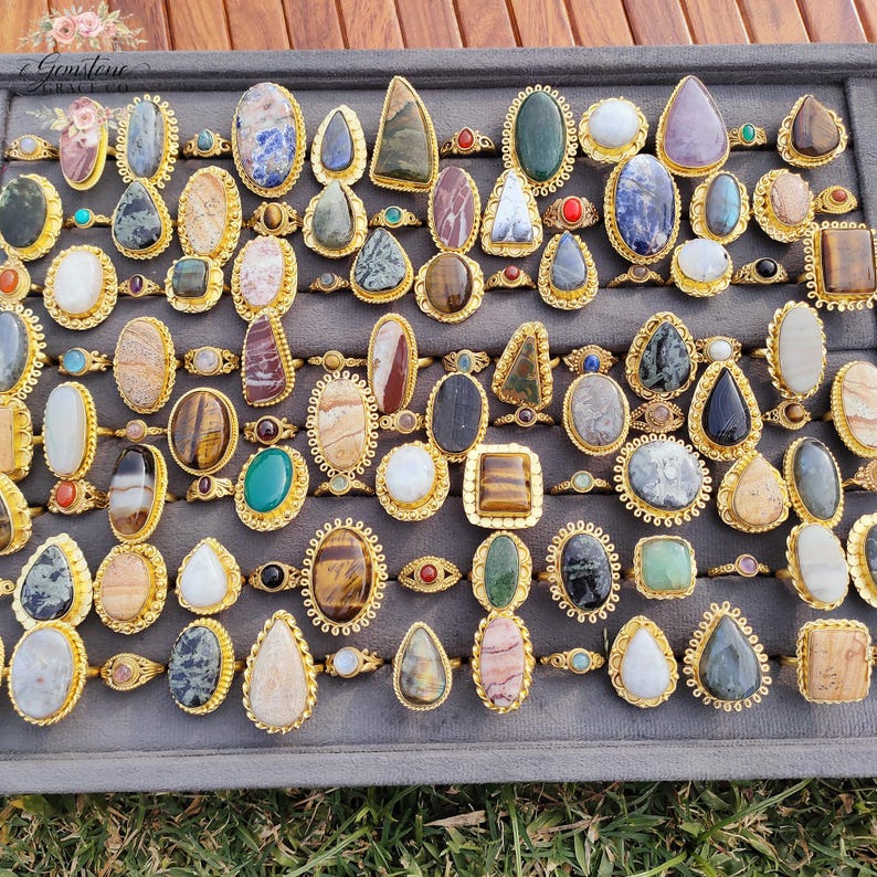 Assorted natural gemstone gold plated rings, wholesale gemstone ring lot, bulk boho rings for resale, handmade crystal rings collection, gold plated brass rings women, mixed stone ring assortment, boutique jewelry supplier rings, bohemian stacking rings set, minimalist gemstone rings bulk, adjustable gold rings wholesale, mothers day gift rings set, spiritual crystal jewelry lot, reseller jewelry bulk pack, artisan handmade ring mix, trendy boho gift jewelry