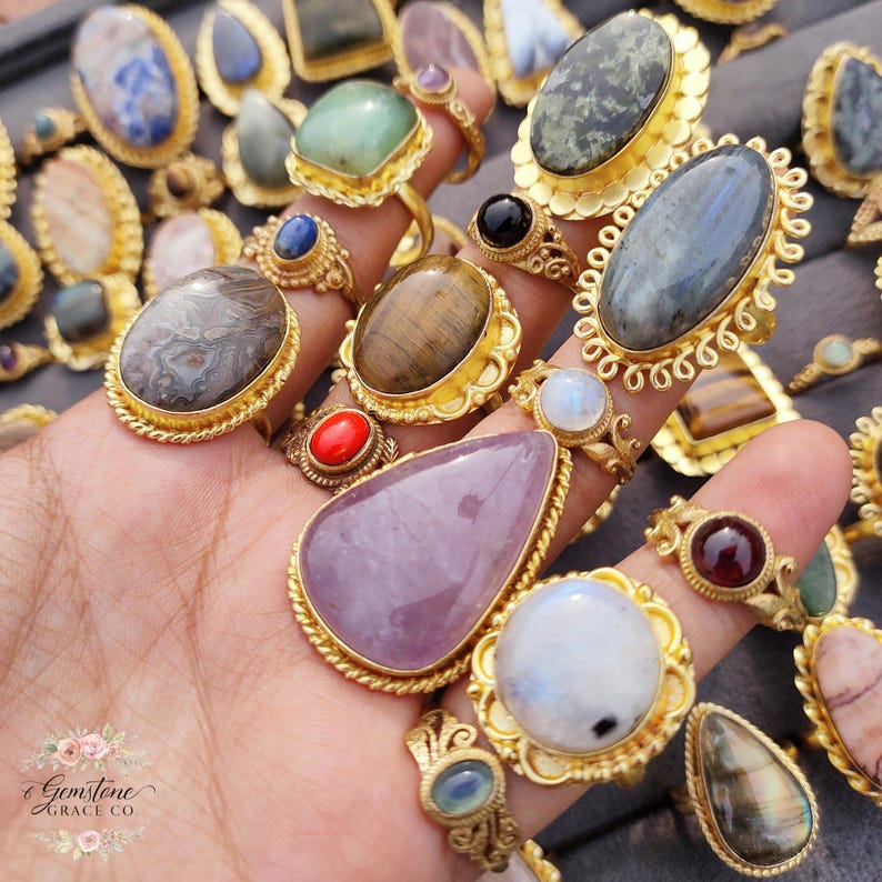 Assorted natural gemstone gold plated rings, wholesale gemstone ring lot, bulk boho rings for resale, handmade crystal rings collection, gold plated brass rings women, mixed stone ring assortment, boutique jewelry supplier rings, bohemian stacking rings set, minimalist gemstone rings bulk, adjustable gold rings wholesale, mothers day gift rings set, spiritual crystal jewelry lot, reseller jewelry bulk pack, artisan handmade ring mix, trendy boho gift jewelry