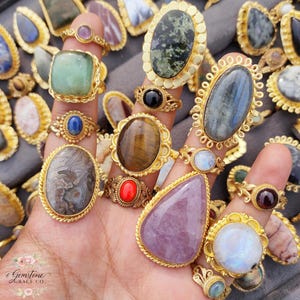 Assorted natural gemstone gold plated rings, wholesale gemstone ring lot, bulk boho rings for resale, handmade crystal rings collection, gold plated brass rings women, mixed stone ring assortment, boutique jewelry supplier rings, bohemian stacking rings set, minimalist gemstone rings bulk, adjustable gold rings wholesale, mothers day gift rings set, spiritual crystal jewelry lot, reseller jewelry bulk pack, artisan handmade ring mix, trendy boho gift jewelry