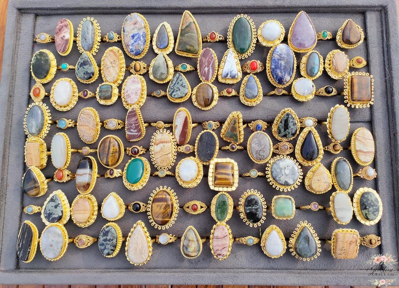 Assorted natural gemstone gold plated rings, wholesale gemstone ring lot, bulk boho rings for resale, handmade crystal rings collection, gold plated brass rings women, mixed stone ring assortment, boutique jewelry supplier rings, bohemian stacking rings set, minimalist gemstone rings bulk, adjustable gold rings wholesale, mothers day gift rings set, spiritual crystal jewelry lot, reseller jewelry bulk pack, artisan handmade ring mix, trendy boho gift jewelry