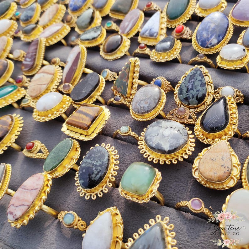 Assorted natural gemstone gold plated rings, wholesale gemstone ring lot, bulk boho rings for resale, handmade crystal rings collection, gold plated brass rings women, mixed stone ring assortment, boutique jewelry supplier rings, bohemian stacking rings set, minimalist gemstone rings bulk, adjustable gold rings wholesale, mothers day gift rings set, spiritual crystal jewelry lot, reseller jewelry bulk pack, artisan handmade ring mix, trendy boho gift jewelry
