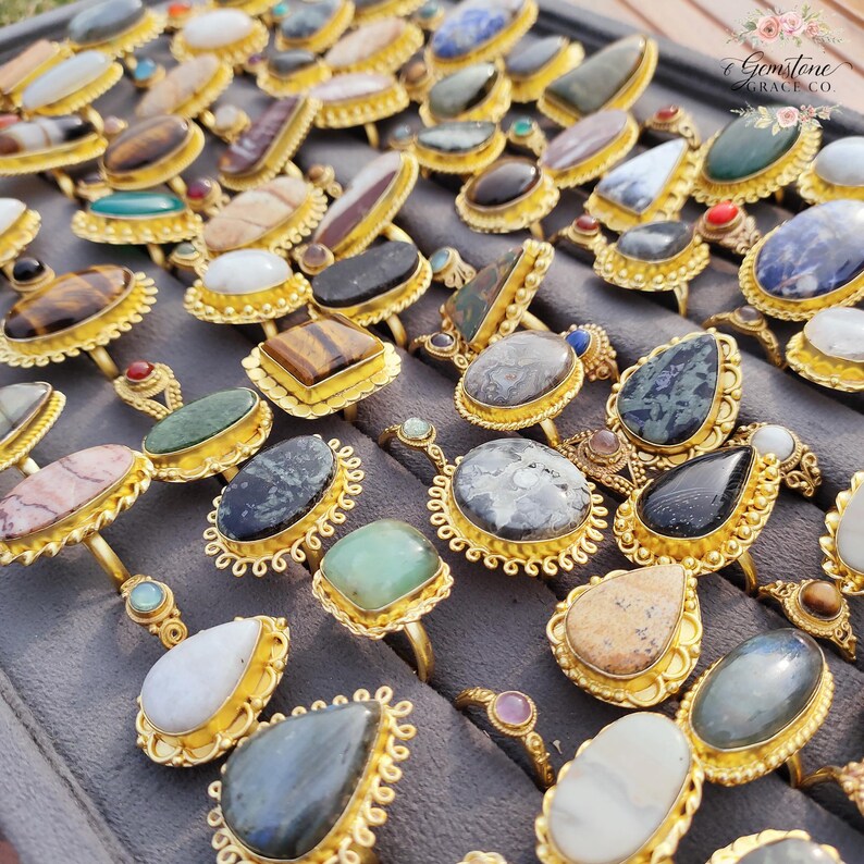 Assorted natural gemstone gold plated rings, wholesale gemstone ring lot, bulk boho rings for resale, handmade crystal rings collection, gold plated brass rings women, mixed stone ring assortment, boutique jewelry supplier rings, bohemian stacking rings set, minimalist gemstone rings bulk, adjustable gold rings wholesale, mothers day gift rings set, spiritual crystal jewelry lot, reseller jewelry bulk pack, artisan handmade ring mix, trendy boho gift jewelry