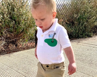 Birthday golf polo, Front and back, with golf green, argyle blue orange flag, name or daddys caddy on back, new baby gift, baby to toddler