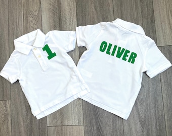 Front and back -Boy, girl, toddler white  polo golf SHIRT with birthday number, personalized on back in green, golf caddy