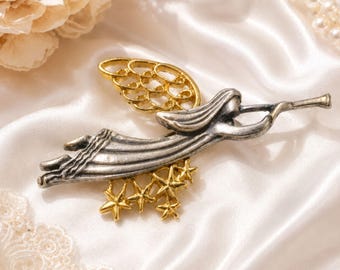 Broche de anjo vintage em estanho e tom dourado