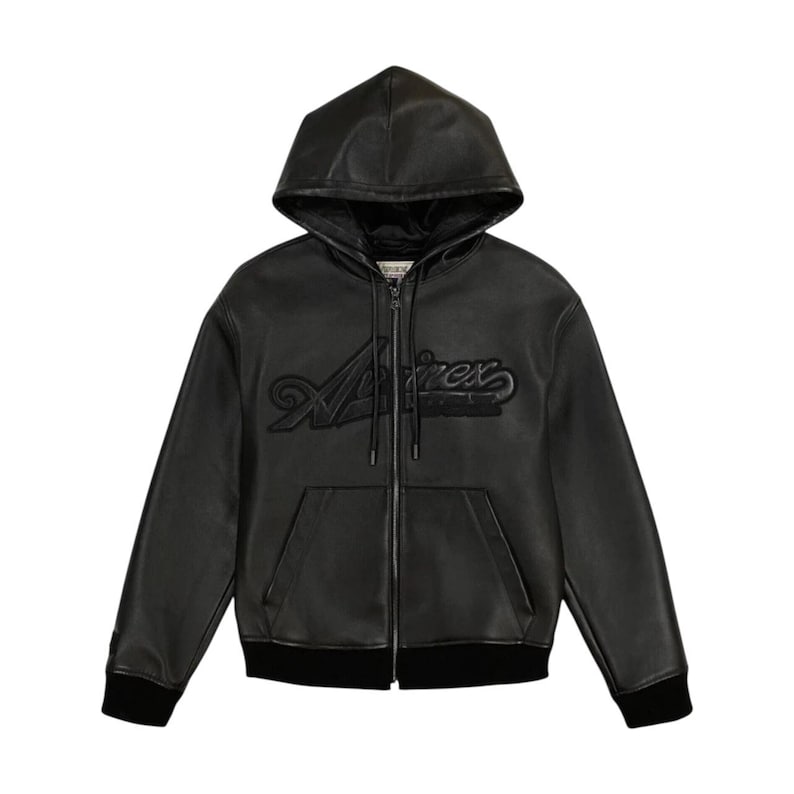 May include: Black leather zip-up hoodie with a hood and front pockets. The jacket features the word "A&eacute;rex" in a raised, stylized font across the chest. The cuffs and hem are ribbed.