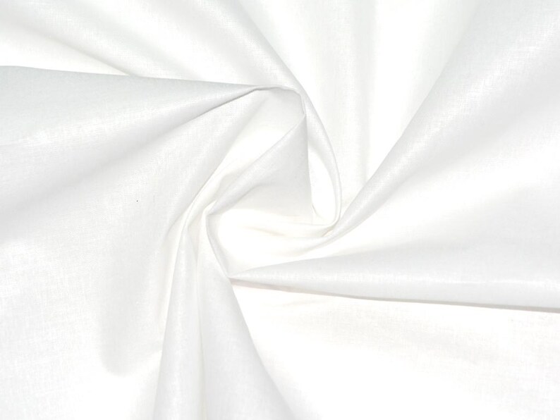 May include: A close-up of white fabric with soft folds and a subtle sheen. The fabric is tightly swirled, creating a dynamic pattern of light and shadow. The material appears smooth and possibly lightweight.