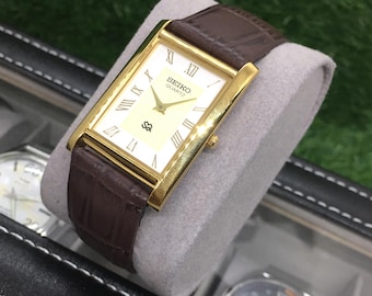 Vintage Seiko Panzeruhr: Goldenes & weisses römisches Ziffernblatt, braunes Lederarmband, Armbanduhr