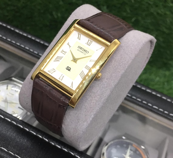 Vintage Seiko Tank Watch: Golden & White Roman Dial, Brown Leather