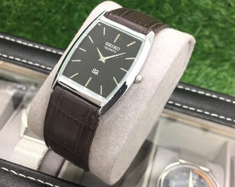 Vintage Seiko Barrel Tank SQ Quartz Black Dial Brown Coloured Leather Strap Wrist Watch