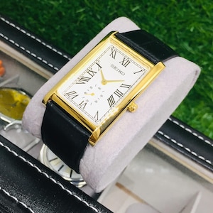 Vintage Seiko Tank Side Second Quartz Watch: Black Leather Strap, Silver & Golden, Wrist Watch