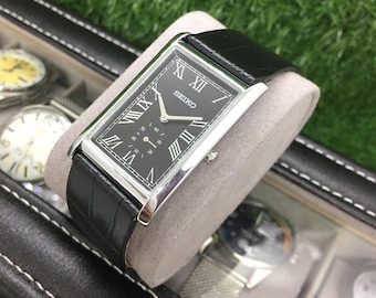 Montre vintage Seiko Tank Side Second Quartz cadran noir avec bracelet en cuir de couleur noire