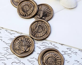 Nautical adhesive wax seals, shells, gold, scallop. Nautical wax seals for envelopes & wedding invitations.