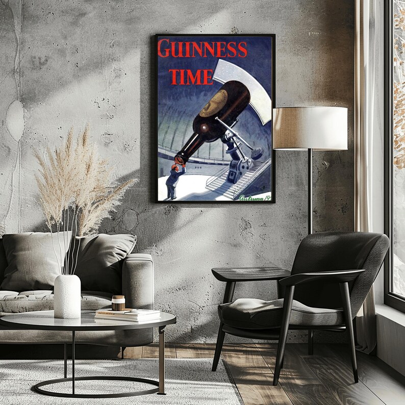 May include: A framed vintage Guinness Time advertisement. The artwork features a large Guinness bottle being poured by a man into a glass. The words "Guinness Time" are in red letters at the top of the image. The artwork is set against a dark blue background.